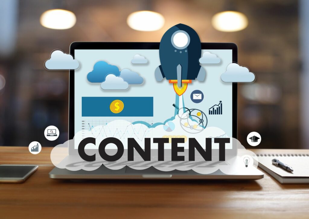 A rocket launching on top of a laptop with the text "Content" with the clouds as its backdrop, representing boosting with content marketing.
