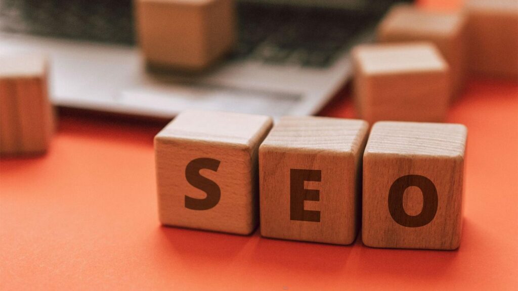 Three wooden blocks forming the word, "SEO."